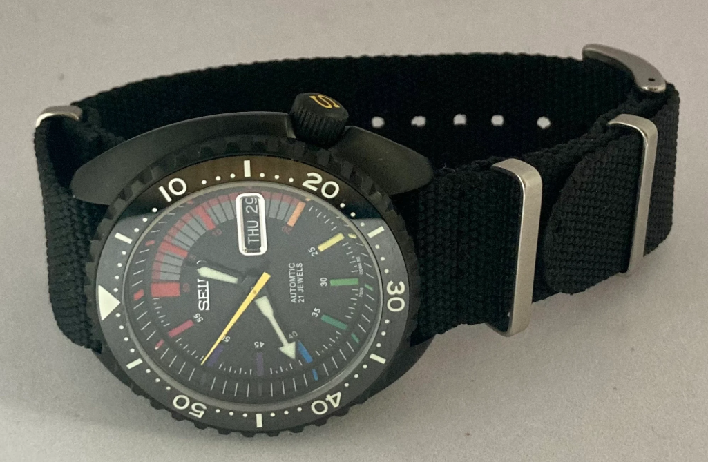 SKX Black Turtle with colourful dial and Chapter Ring, Yellow accent Signed Crown and Sweep hand. Lumed flat ceramic bezel insert