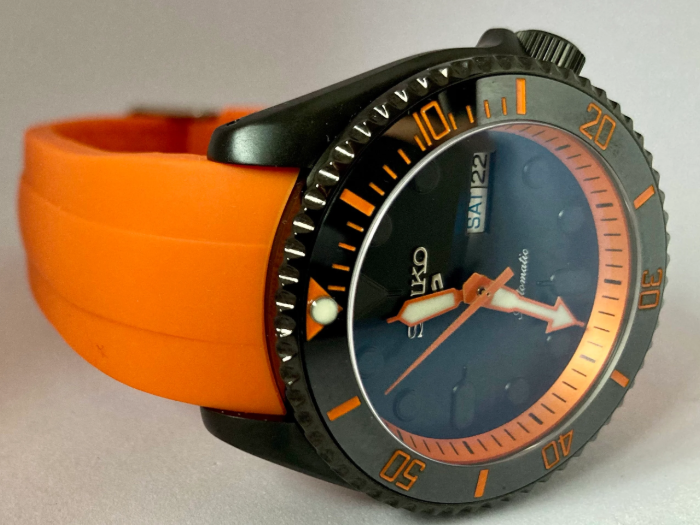 Full on Black and Orange Diver with 4 O’clock Crown on an Orange Curved end silicone rubber strap