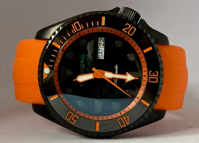 Full on Black and Orange Diver with 4 O’clock Crown on an Orange Curved end silicone rubber strap