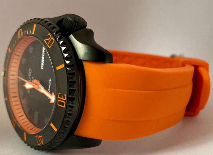 Full on Black and Orange Diver with 4 O’clock Crown on an Orange Curved end silicone rubber strap